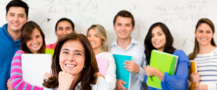 Teacher in a classroom with a group of students
