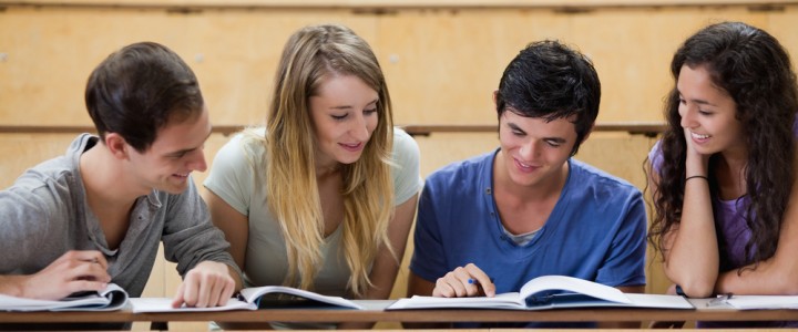 Students working together in an amphitheater