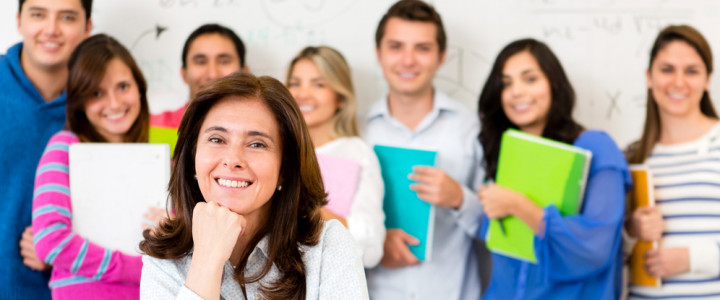 Teacher in a classroom with a group of students